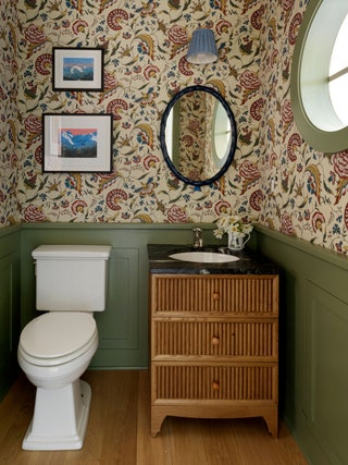 The walls of the guest bathroom in this Colorado house by Salvesen Graham are covered innbspAntoinette Poissons Jaipur...