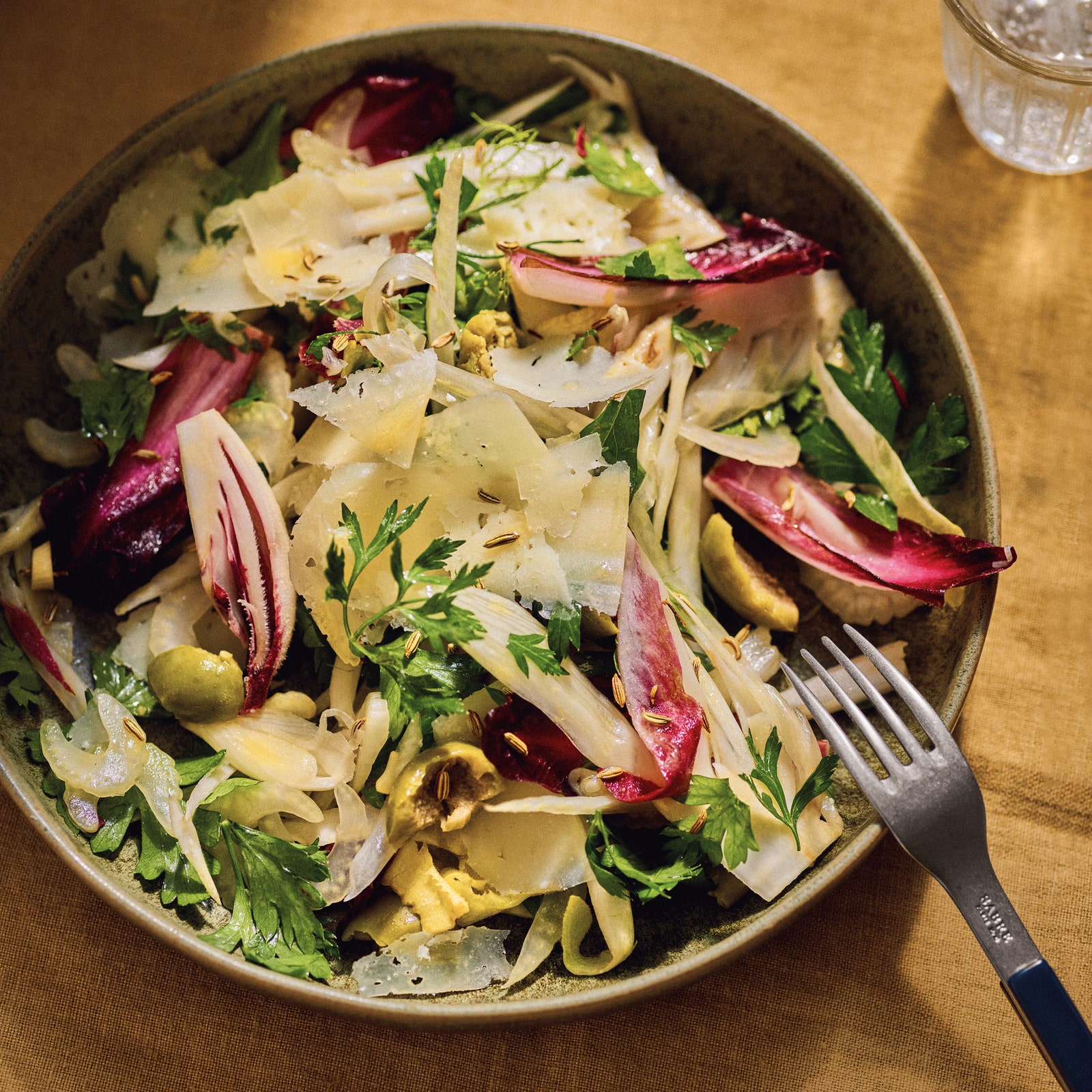 Chicory, fennel and celery salad with toasted fennel seeds, Castelvetrano olives and pecorino